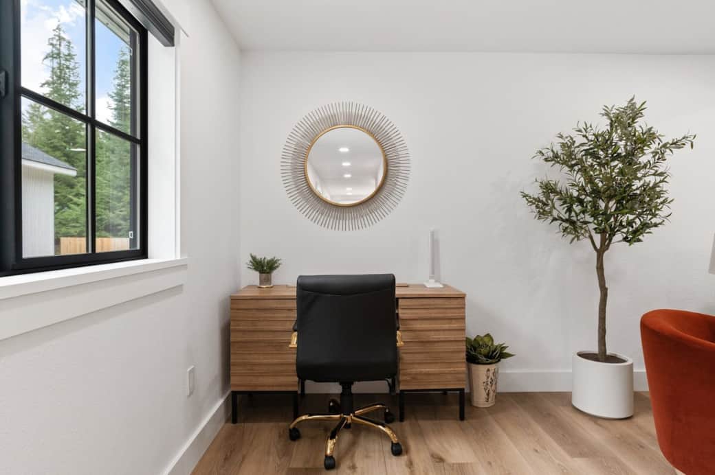 This workstation has multiple USB ports in the wall & behind the desk lamp. A cell phone charging station, Welcome Book, & some info about the area are located on the desk. There is abundant bright light and open space. There is high-speed internet. 