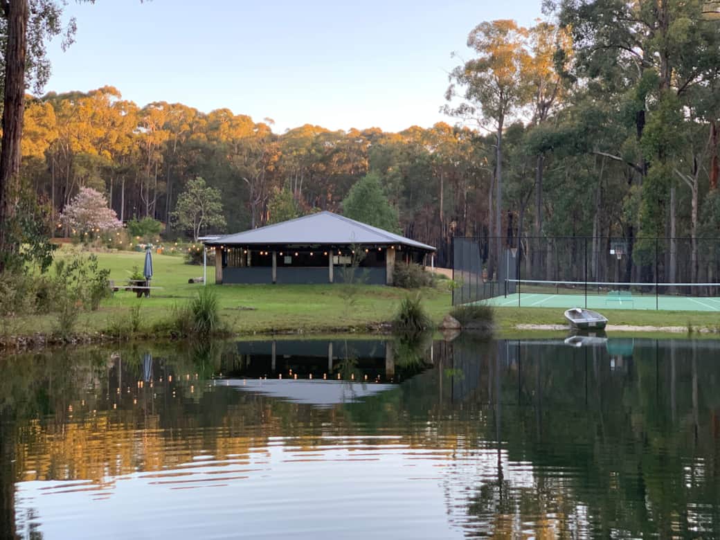 Tennis court, pavilion and swimming hole