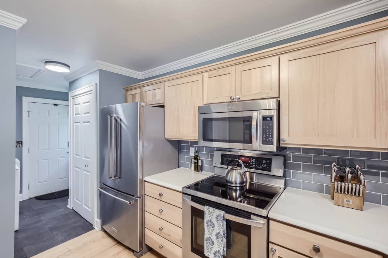 Kitchen opens to a pantry and laundry area
