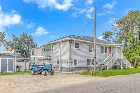 Private coastal retreat featuring a golf cart for easy beach cruising & vacation fun Private coastal