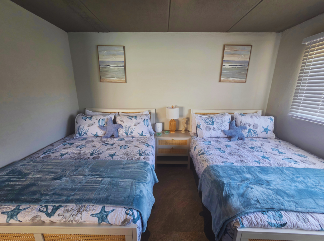 Two Queen beds with premium linens for the perfect night's sleep. Treasure Island, FL