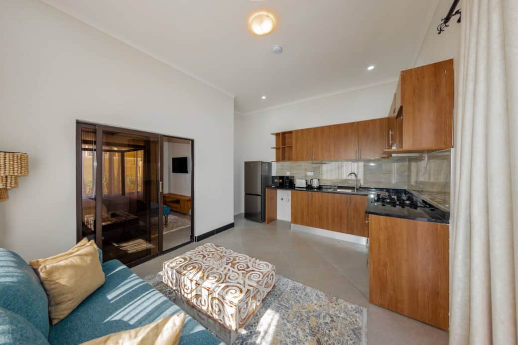 Open-plan studio with fully equipped kitchen and lounge area