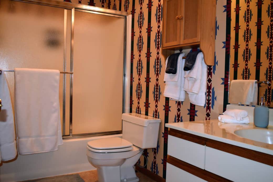Upstairs bathroom, accessible from Bedroom 1 and from the hall.