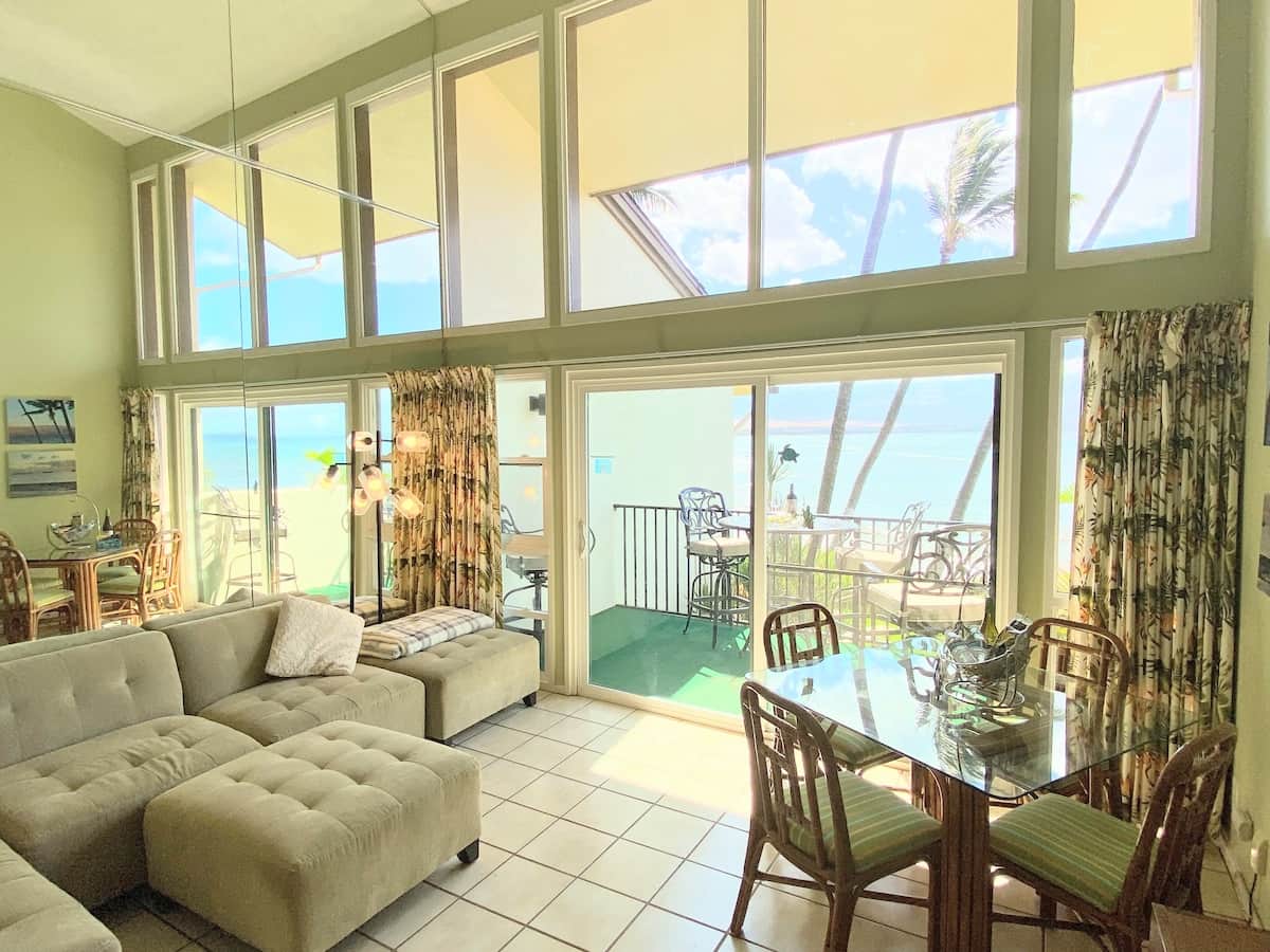 Great relaxing area including a awesome couch, table for four.