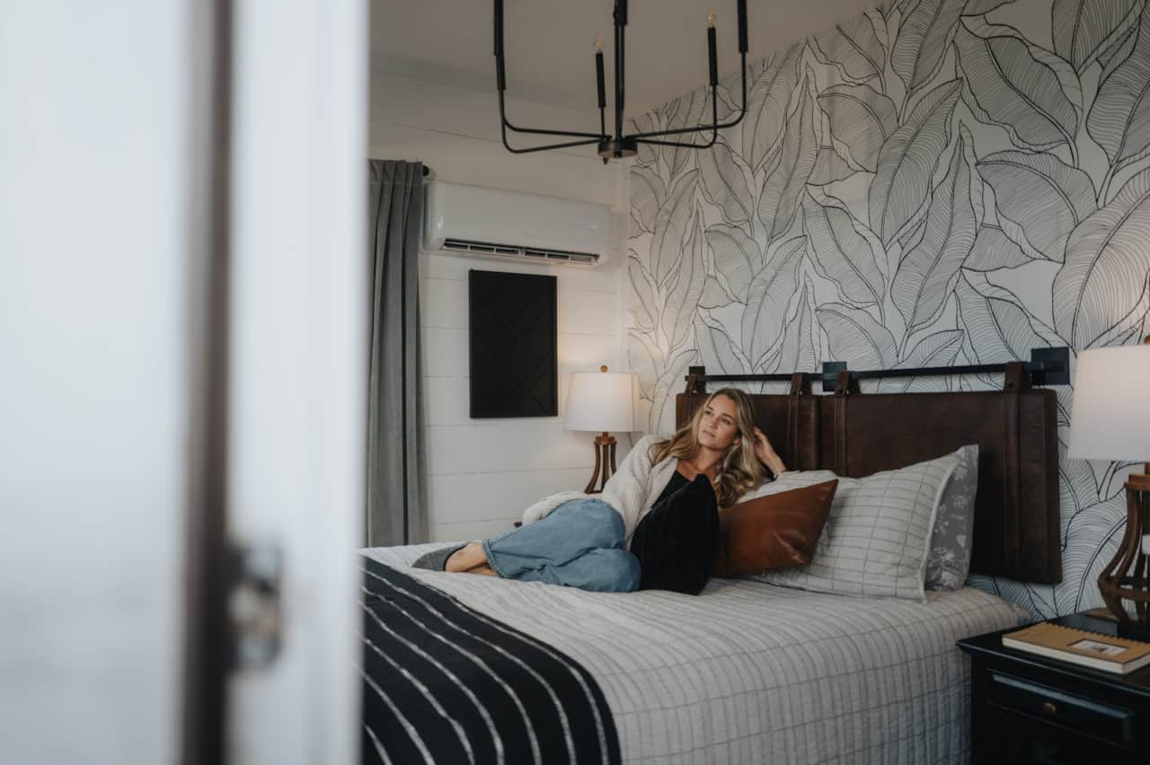 Soft, neutral colors create a warm and inviting bedroom escape.