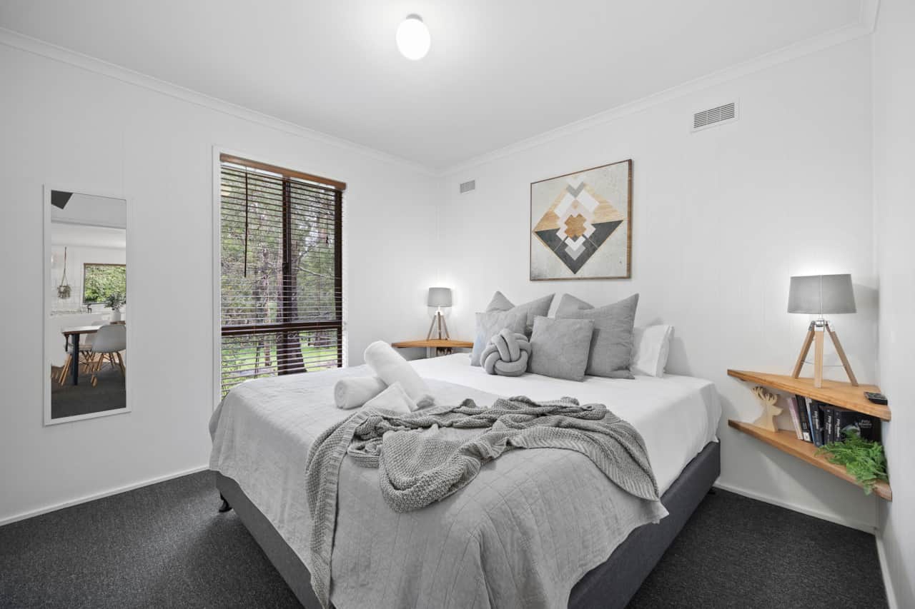 Bedroom 1: Tranquil haven for restful nights.