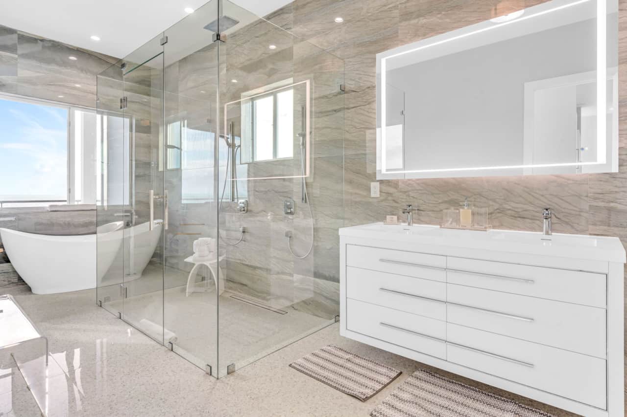 Master bathroom with shower and bath tub
