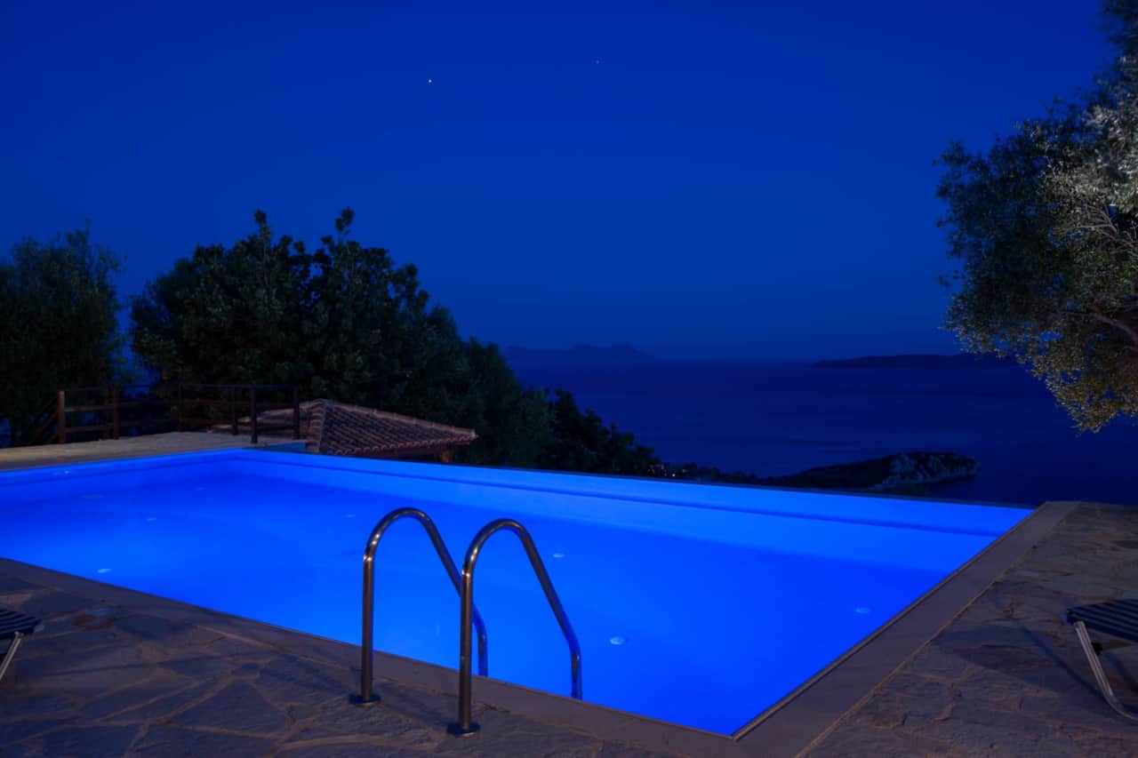 Pool with sea view in night