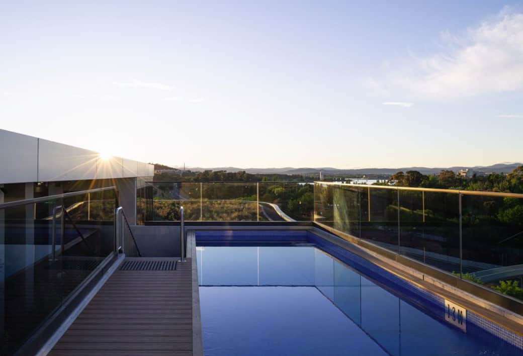 Rooftop pool overlooking the lake, perfect for fireworks and drone light shows.