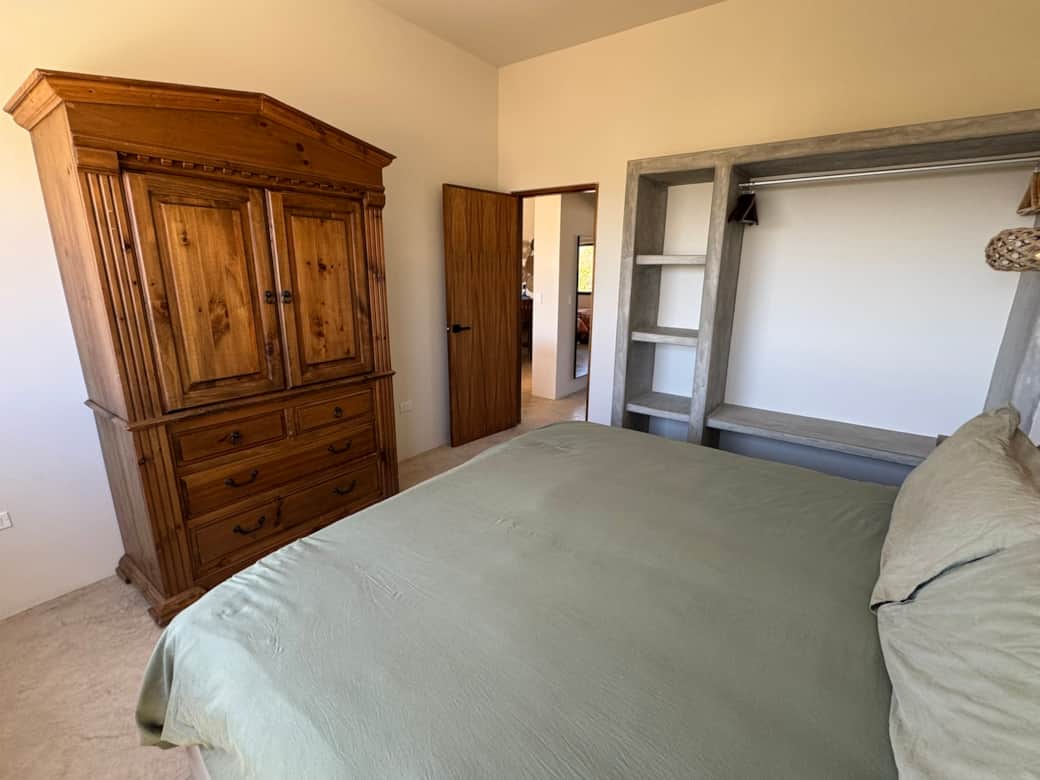 Wake up in the master bedroom’s king-size bed with soft sheets and a stunning wooden dresser. Wake up in the master bedroom’s king-size bed with soft sheets and a stunning wooden dresser.