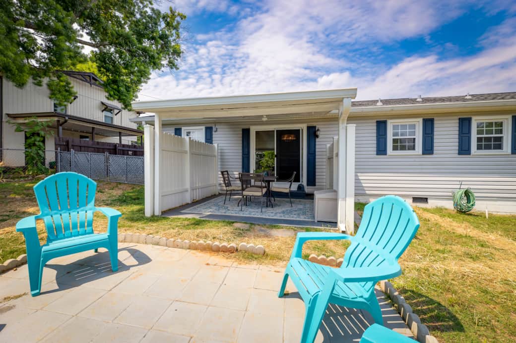 Two seating areas in backyard.