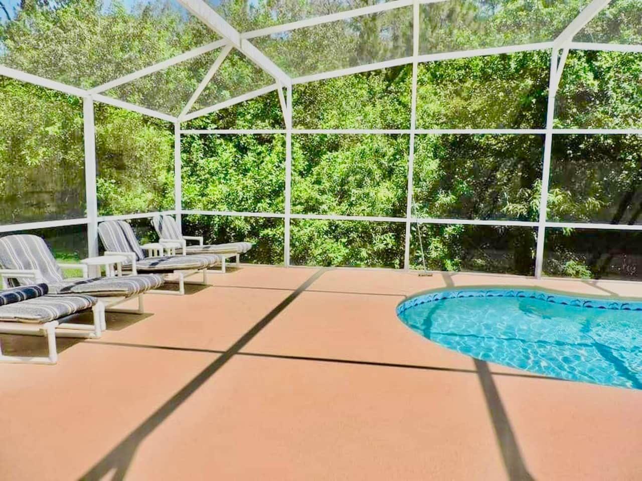 An extended deck with lots of space and loungers for sunbathing