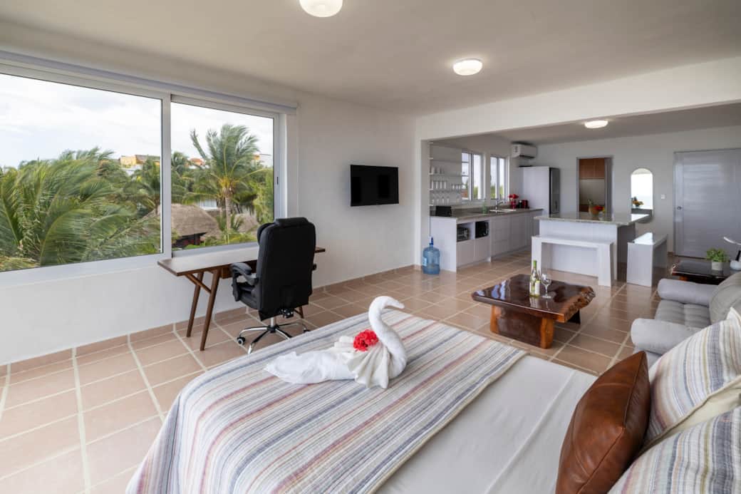 Spacious studio with living room, kitchen, office, bedroom and panoramic sea view