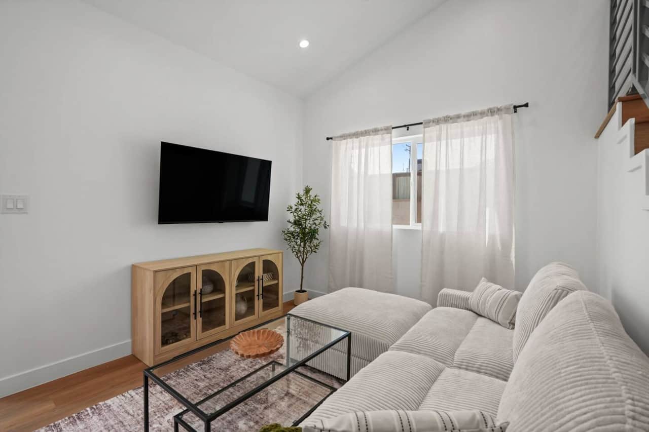 Complete with a coffee table setup and console cabinet for added convenience.