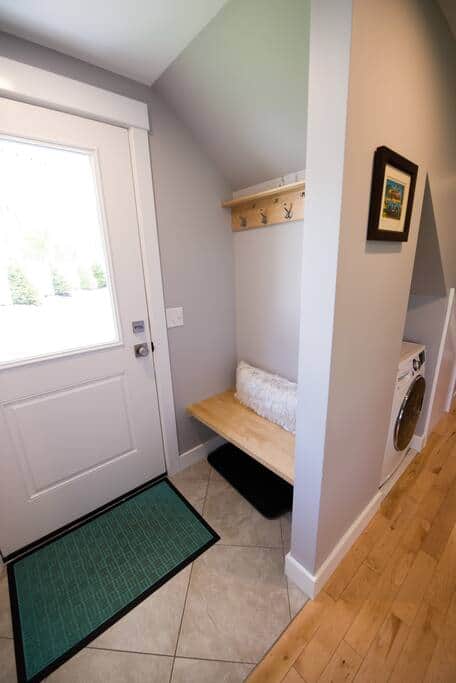 Entryway with custom bench and coat hangers