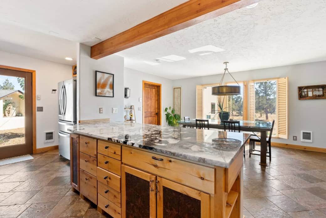 Primary kitchen with granite countertops.