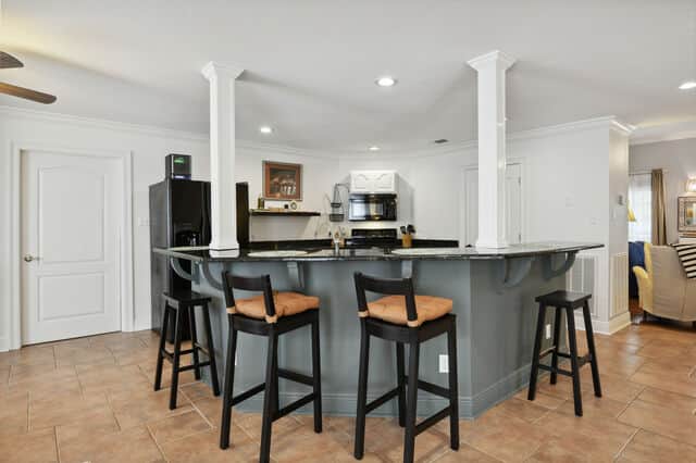 Bar at Kitchen Island features 4 stools