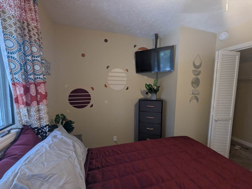 Relax in the Boho room with a 43" TV