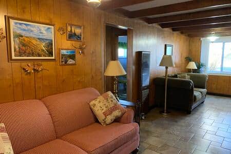 The hall provides additional seating with a full couch and a loveseat.  