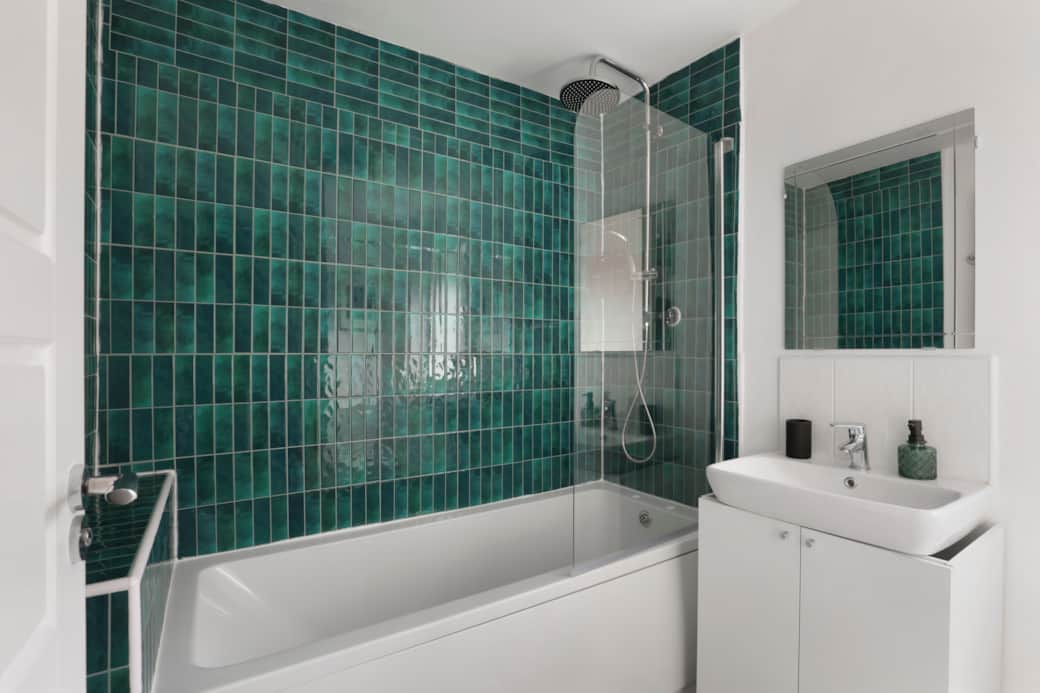 Clean, calm, and equipped with a rainfall shower, toiletries, and soft towels for total relaxation