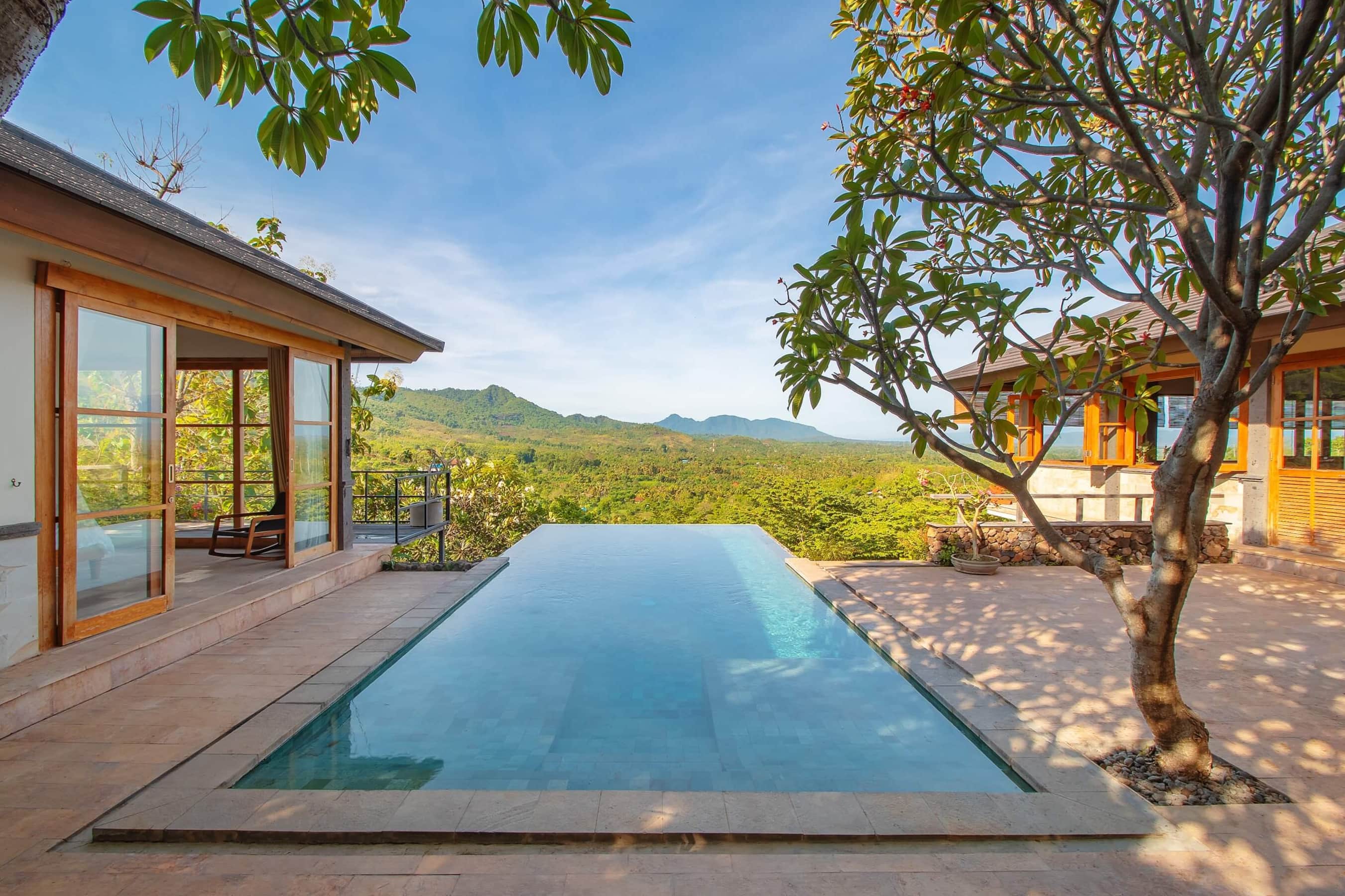Luxury Villa Naga with modern architecture surrounded by tropical gardens