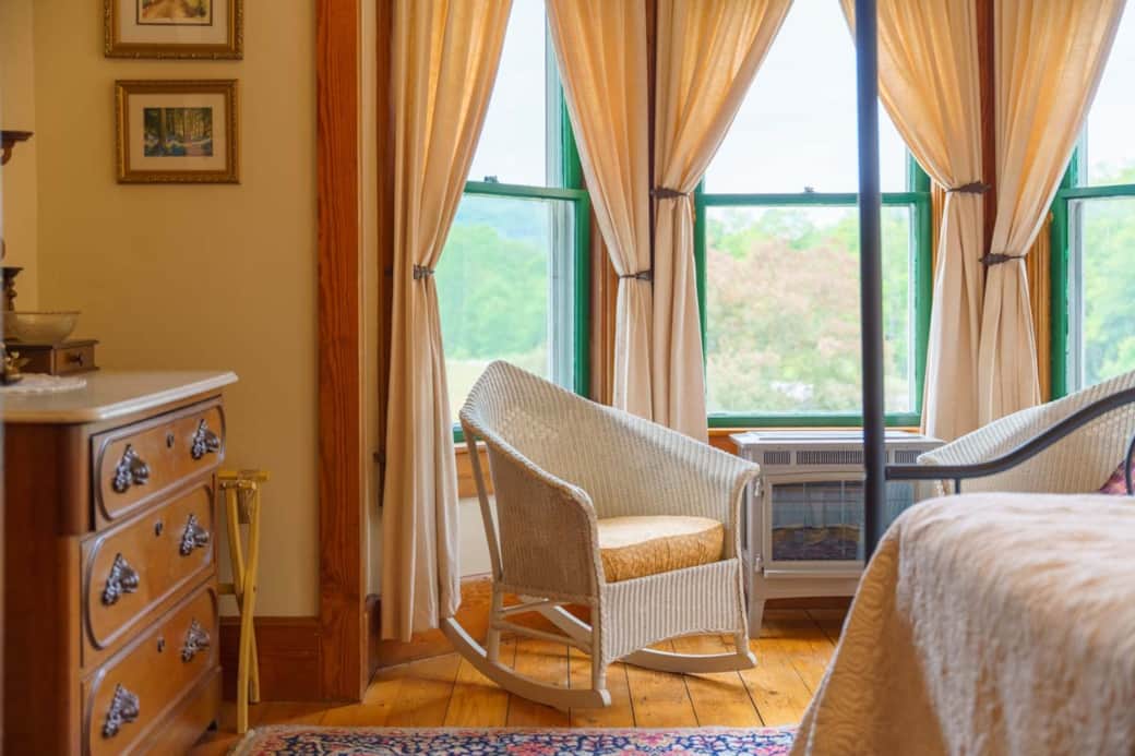 Bay window with views of hay fields, orchard, and hills. Bay window with views of hay fields, orchard, and hills.