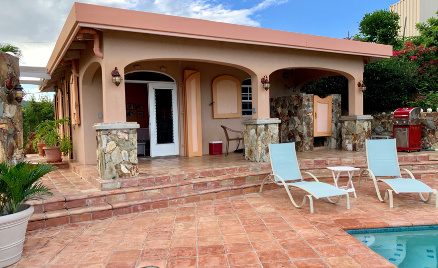 Covered veranda, outdoor shower, and grill deck