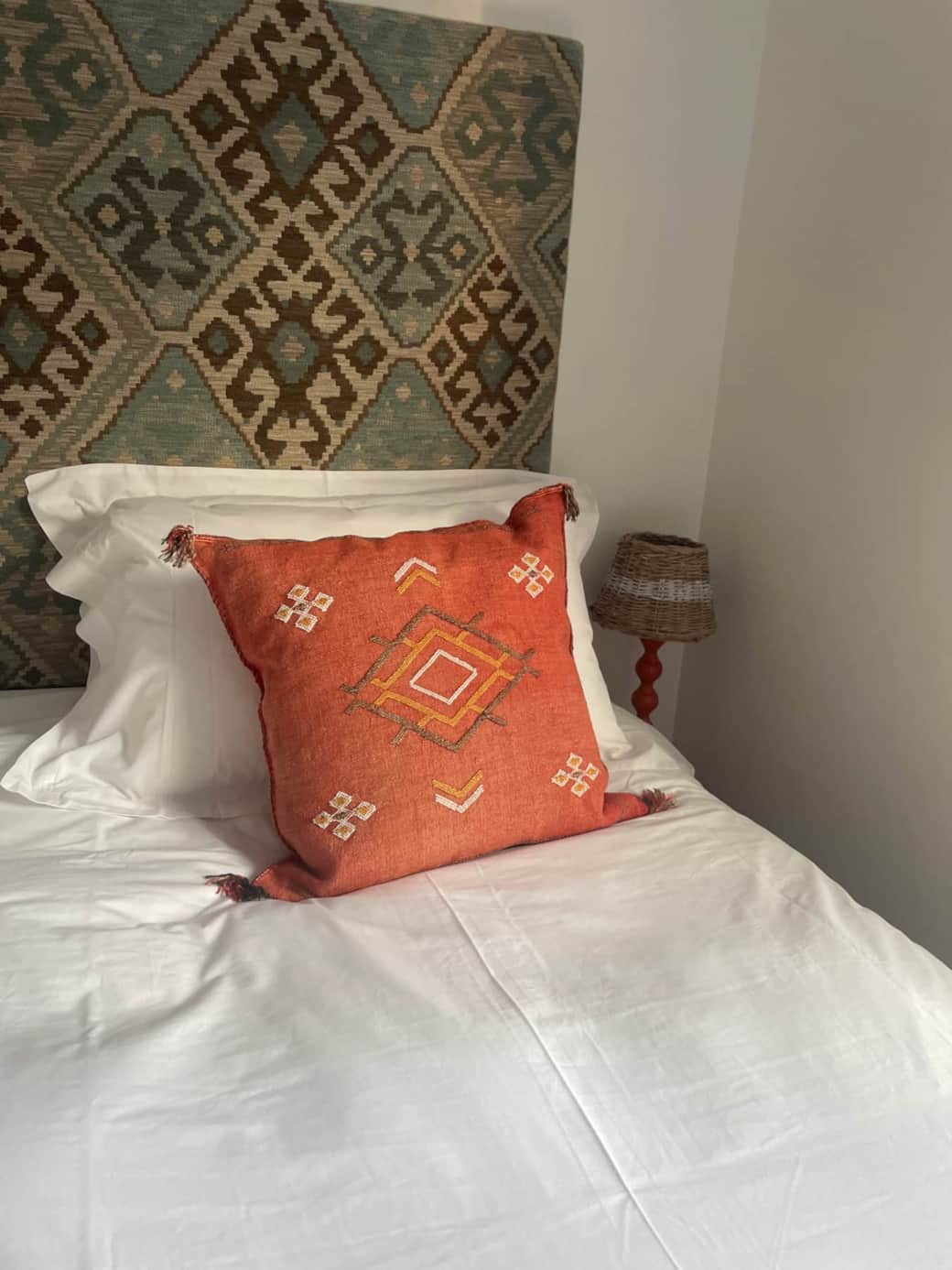 Moroccan cushion and Ikat Headboard at Bluebirds holiday home