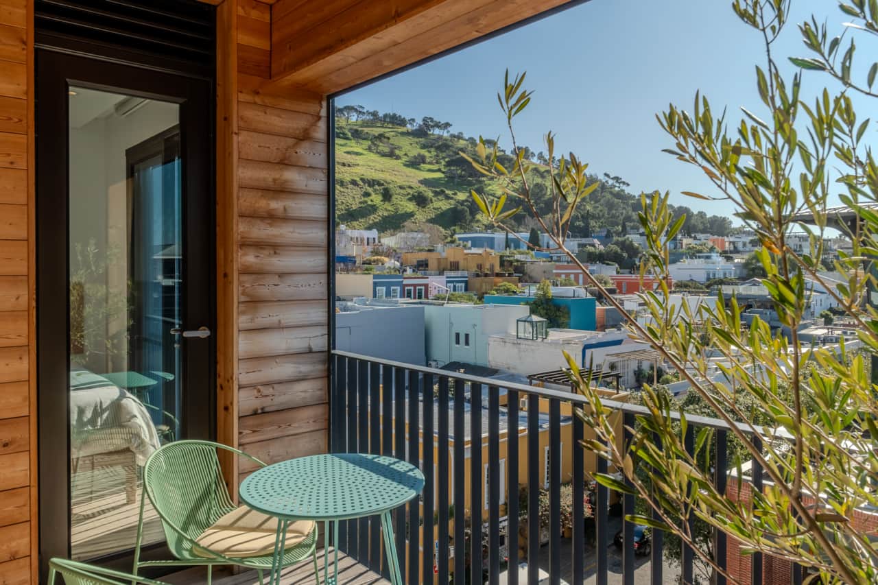 Golden Hour | Unwind, sip, and savour the sunset's warm embrace from your balcony.
