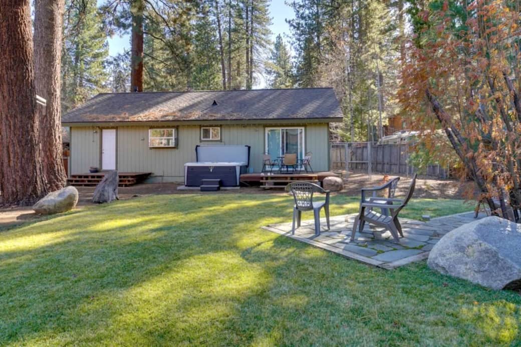 Back yard features lots of open space, patio and deck seating, our NEW Hot Tub and the dog kennel to the right. Back yard features lots of open space, patio and deck seating, our NEW Hot Tub and the dog kennel to the right.