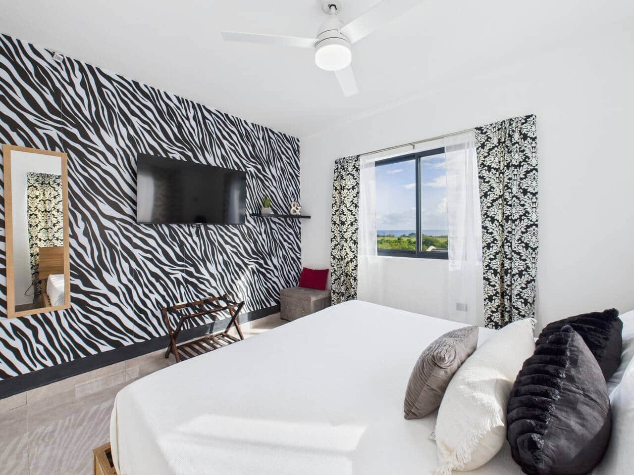Plush bedding, modern furnishings, and stylish décor. 