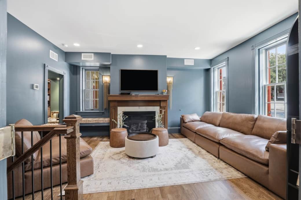 Fireplace living room with smart TV. Additional professional photos coming soon.