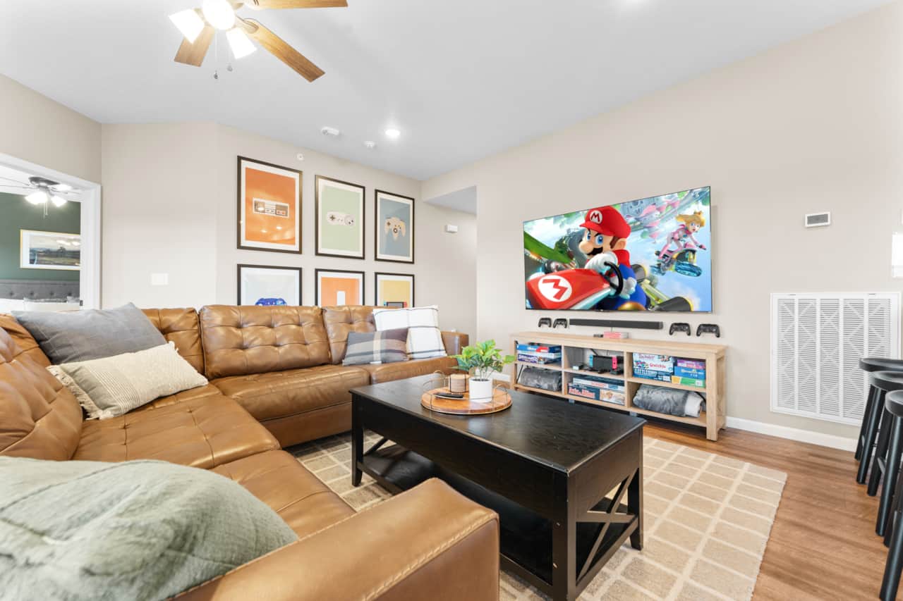 Living room with 75 inch TV and Nintendo Switch