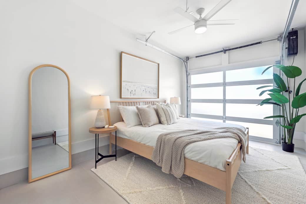 Enjoy a King sized bed with ceiling fan and windowed garage door Enjoy a King sized bed with ceiling fan and windowed garage door