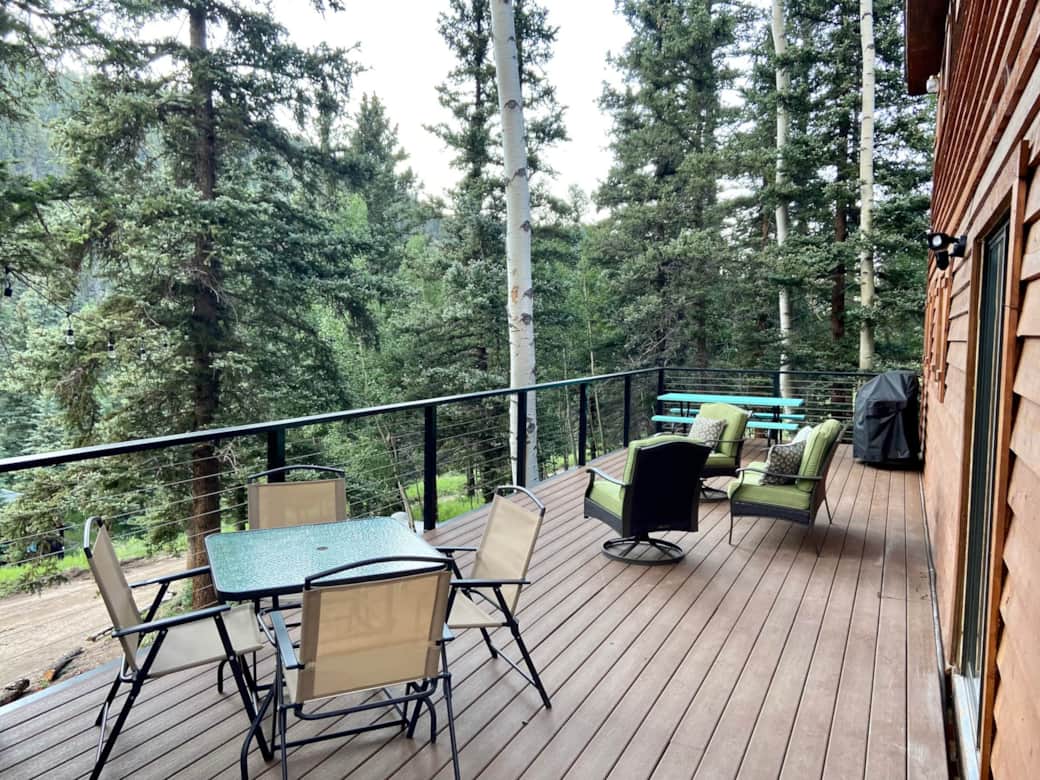 Large west side steel/Trex deck with grill, 2 tables, and a sitting area Large west side steel/Trex deck with grill, 2 tables, and a sitting area
