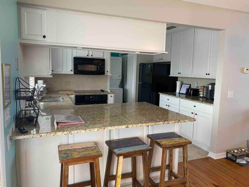 Kitchen with keurig and on demand near boiling water to the right of the sinkand filtered drinking water on the left.