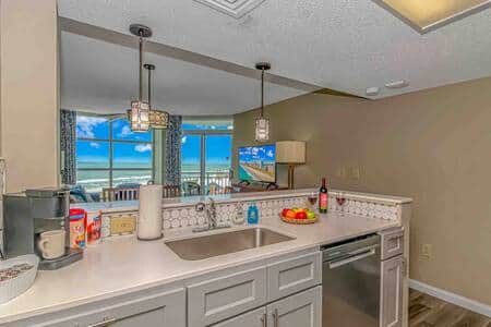 Updated coastal-style kitchen with stunning views of the ocean!