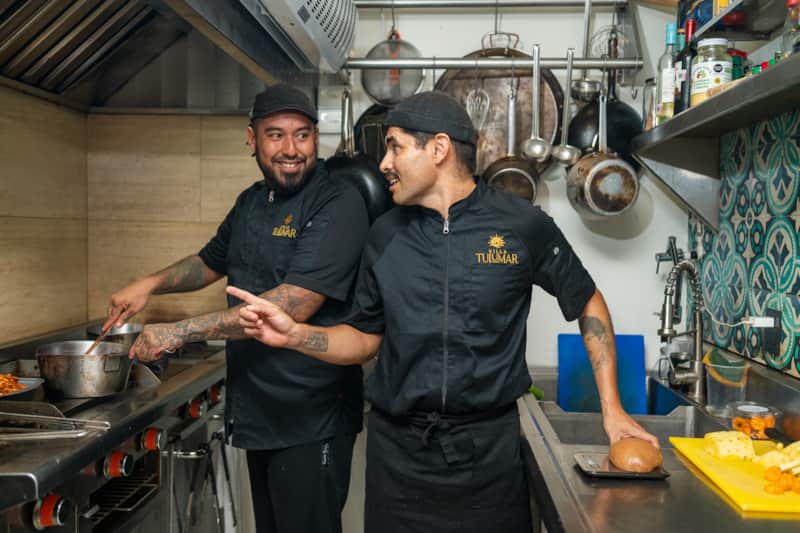 Chef Christian Portillo preparing gourmet dishes in Villa TuluMar’s show kitchen