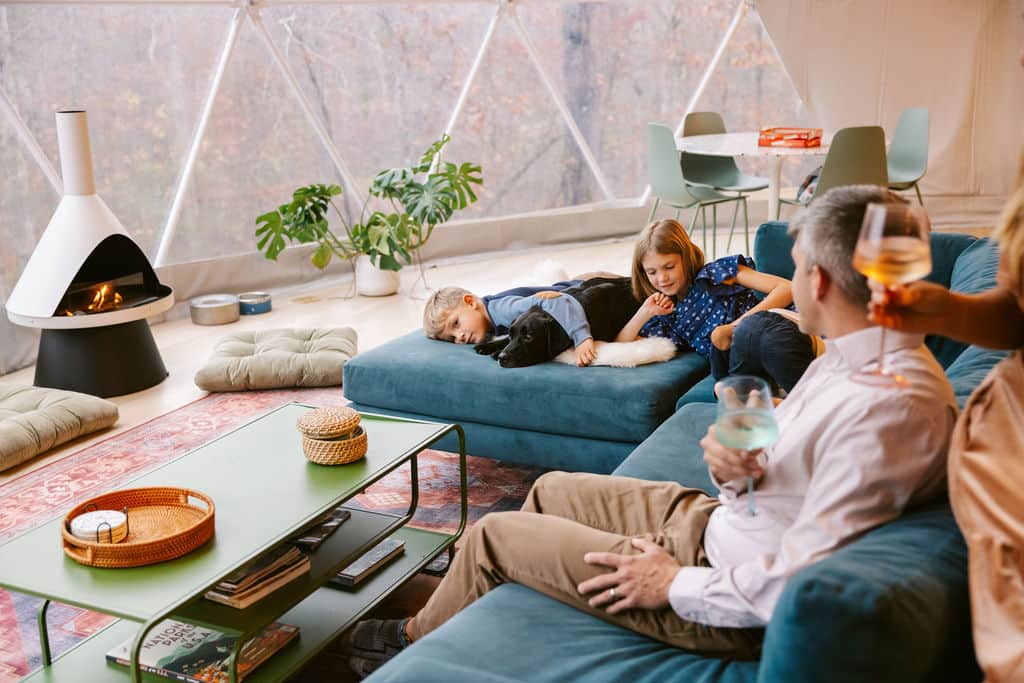 Warm dome living area with fireplace and 20-foot picture window
