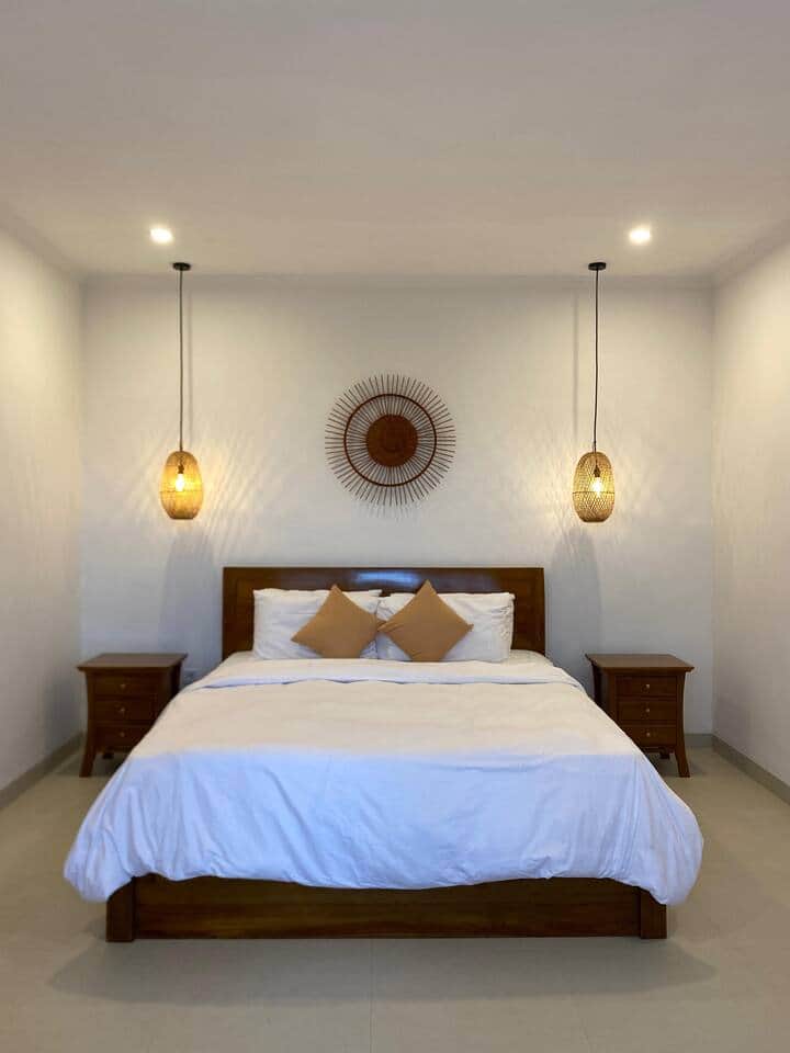 Calm, elegant, and designed for rest – your private retreat with workspace, soft lighting, and a touch of tropical charm.