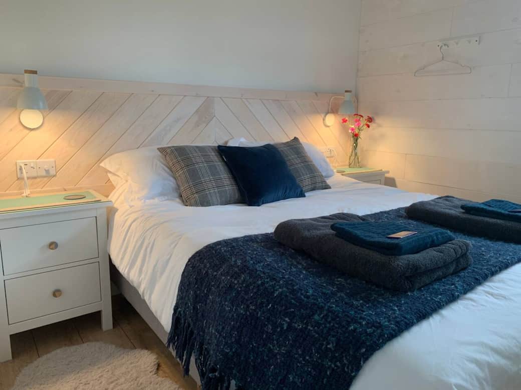 Like everything in Pot Luck, the headboard was carefully designed and made bespoke for the space. There are soft rugs both sides to step out on to in the morning :) Like everything in Pot Luck, the headboard was carefully designed and made bespoke for the space. There are soft rugs both sides to step out on to in the morning :)