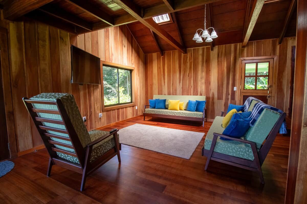 Bright, spacious living room with comfortable seating to relax after a day of adventure.