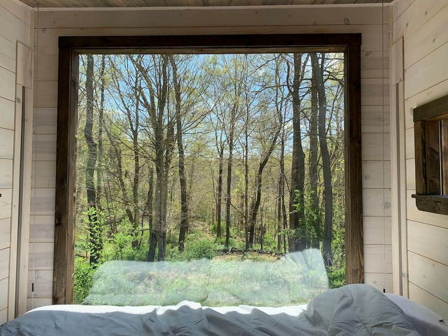 Find yourself looking out at the woods and the pond beyond as you unplug and unwind.