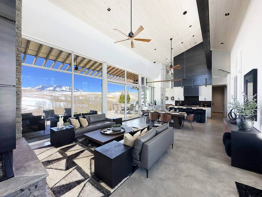 The great room boasts huge views of Wilson Peak  and the golf course.
