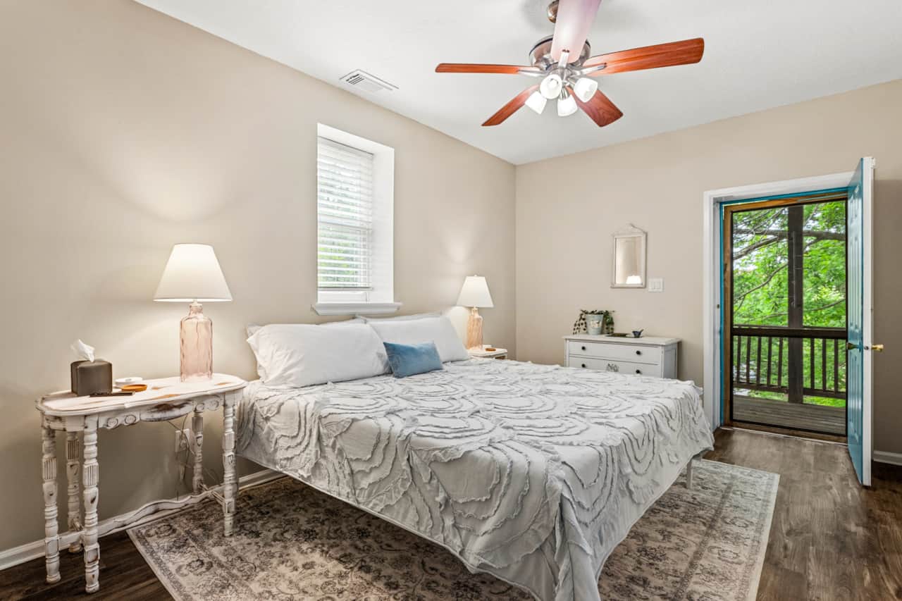 Welcome to the Master Suite...enjoy the King bed, TV, WIC, Full Bath, and private Balcony.