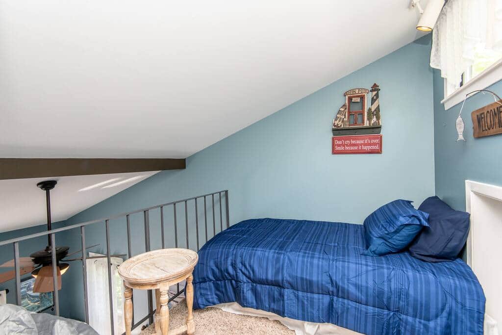 Twin size bed in loft room #2 *Must go through small entry door at top of spiral staircase