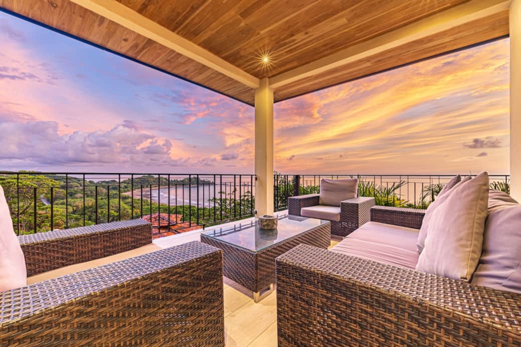 Outdoor lounge set up to enjoye the ocean and sunset views.