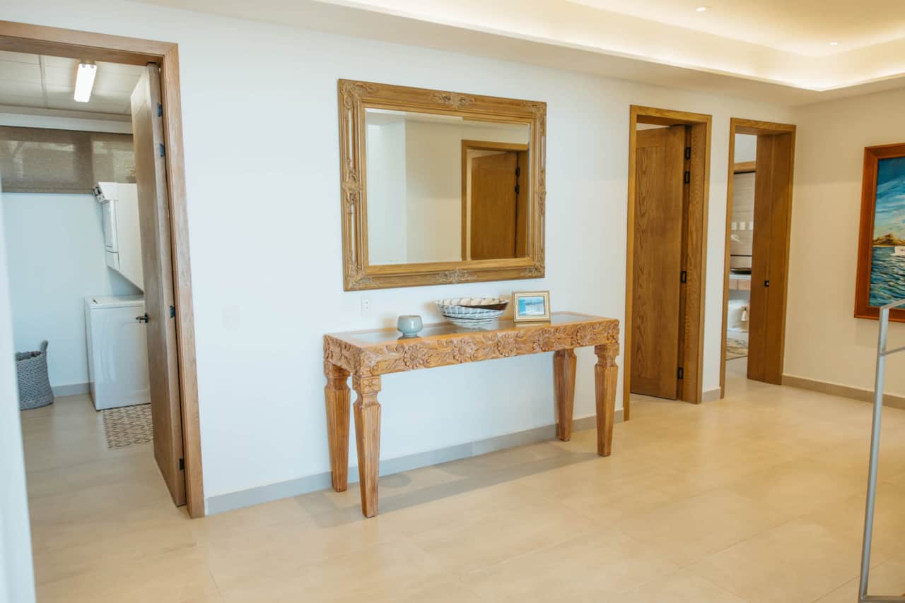 Entry Hallway looking to Laundry and Bedrooms 2 and 3.jpg
