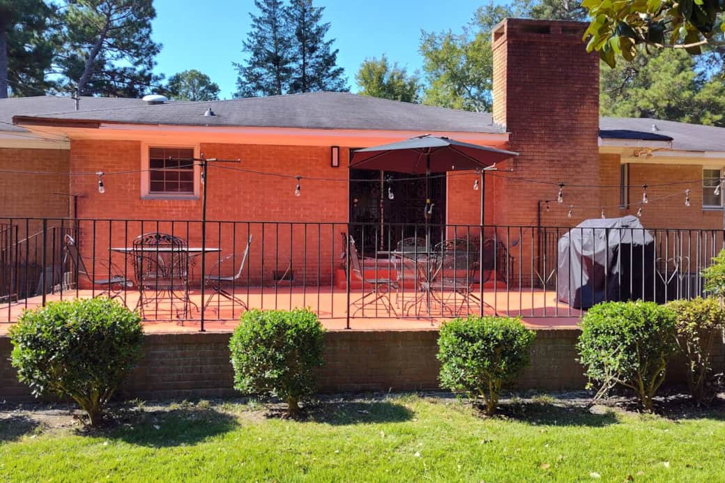 Rear Patio with wrought iron table and chairs Rear Patio with wrought iron table and chairs