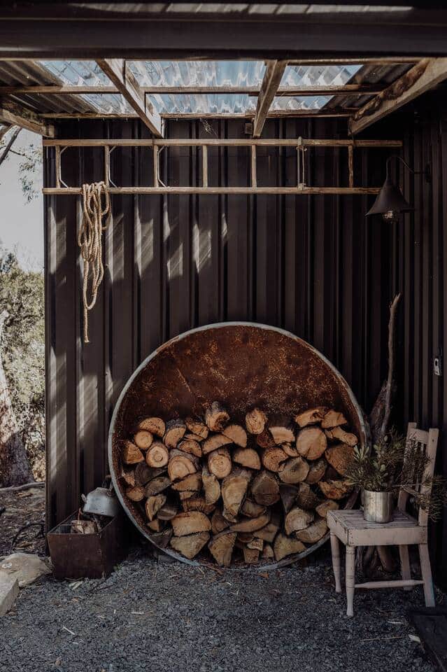 Camp entry, plenty of wood available for the fire.